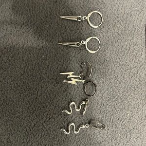 Set of silver dangling earrings